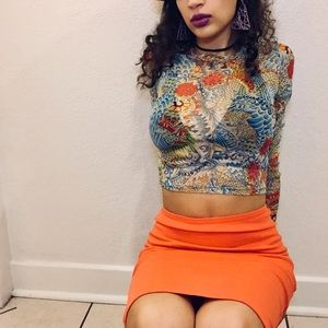 Midi orange pencil skirt with slit in back